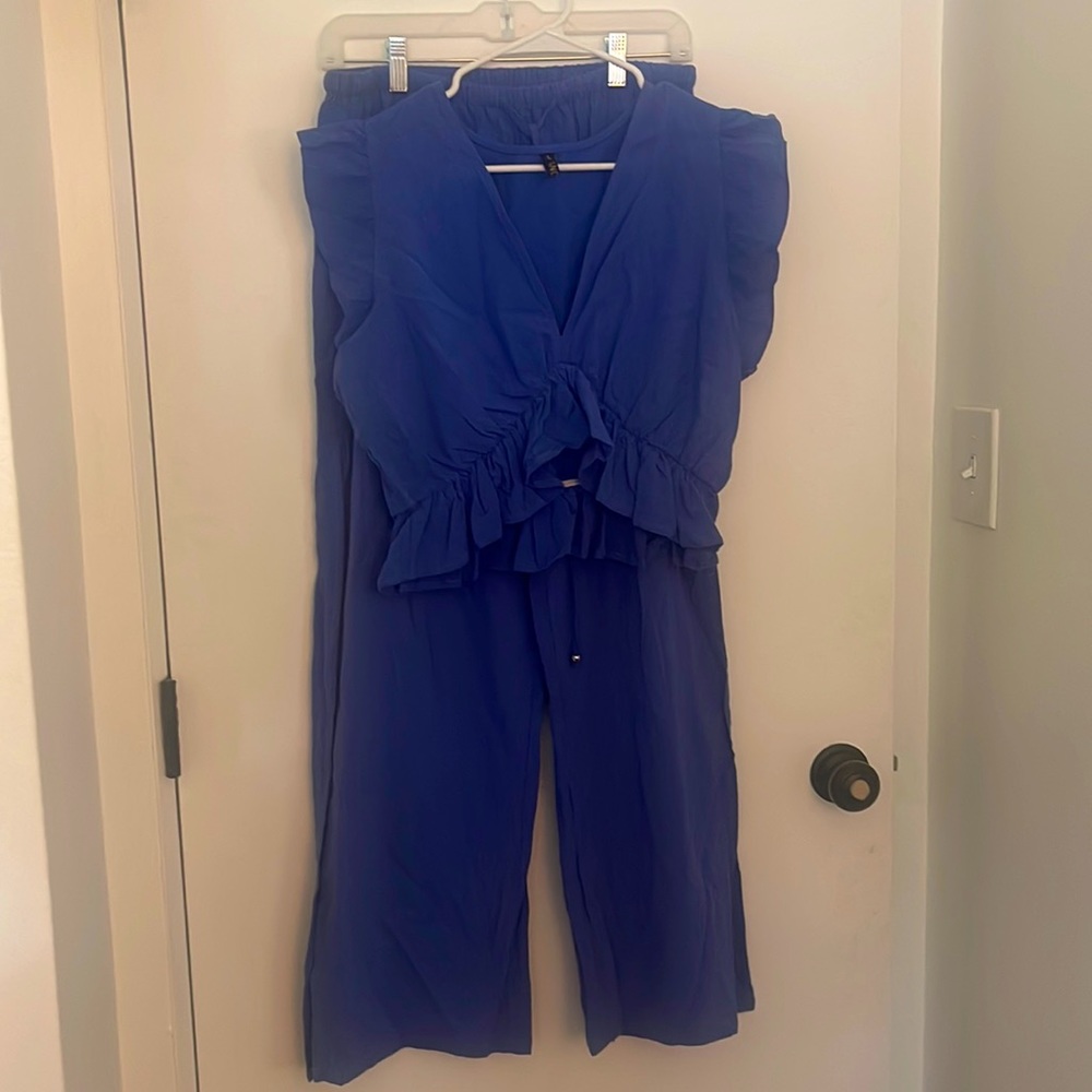A blue matching set. Perfect for beachwear or a summer outfit.